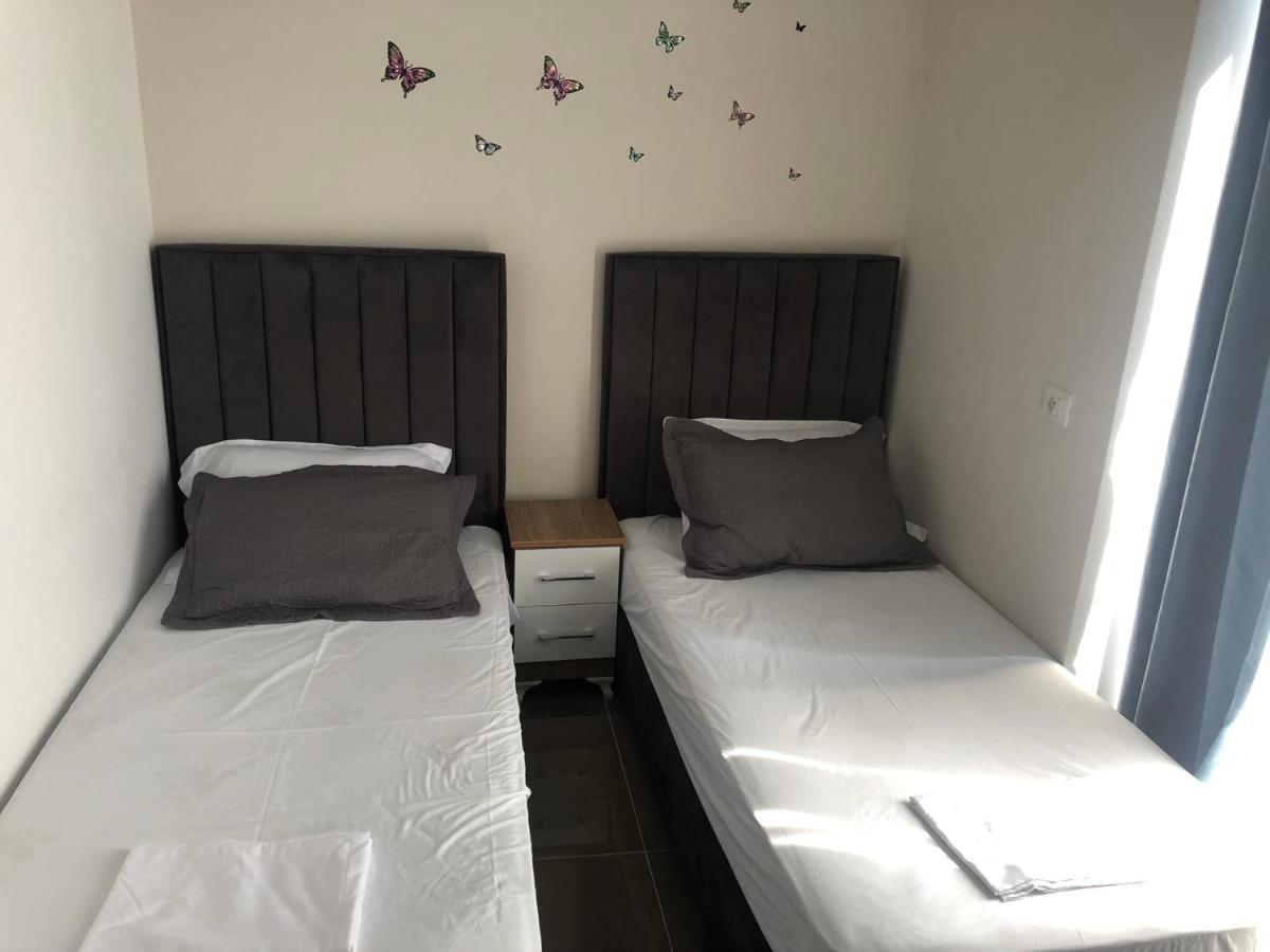 Rezidenca Shopi Apartment เอลบาซาน ภายนอก รูปภาพ