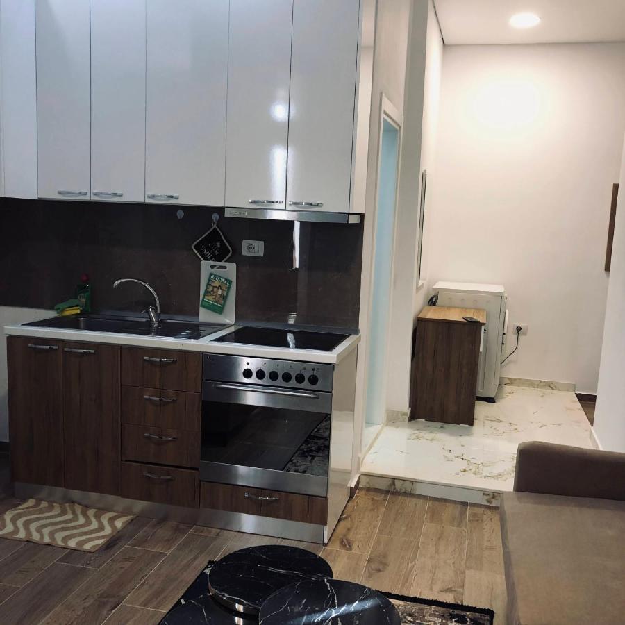 Rezidenca Shopi Apartment เอลบาซาน ภายนอก รูปภาพ